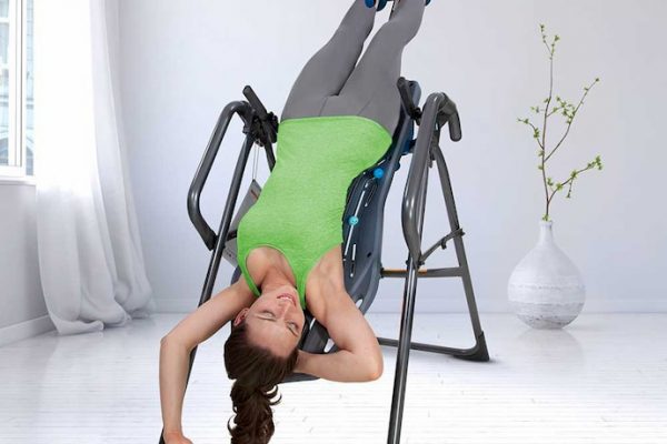 girl on inversion therapy table