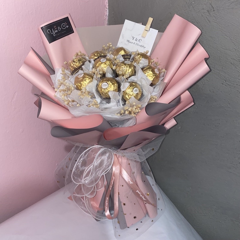 Pink and grey bouquet full of Ferrero Chocolate and a gift card