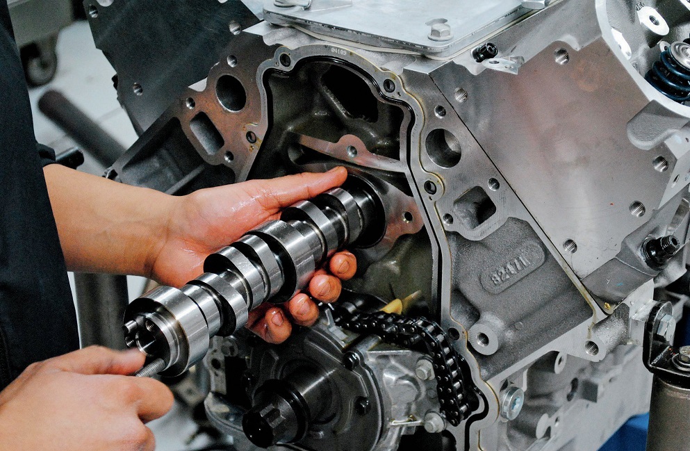 close-up of setting up camshaft of a car engine