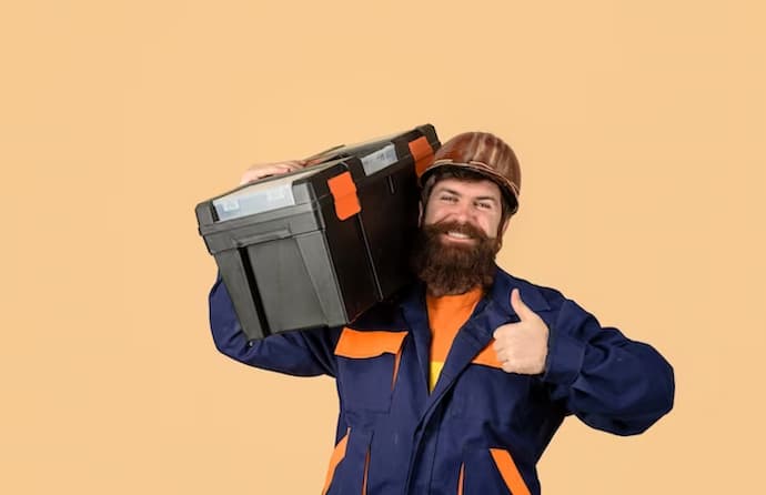 builder man carrying toolbox