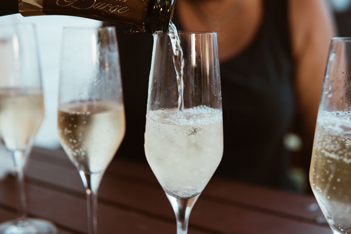 close up of glasses full of champagne