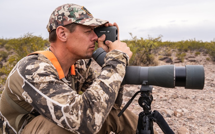 man using range finder